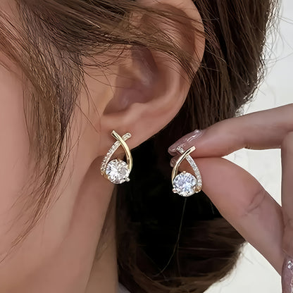 Pendientes Ziro – Cruz dorada y circonitas