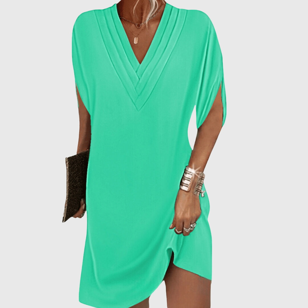 Modelo con vestido corto elegante Anita | Horizoncor México