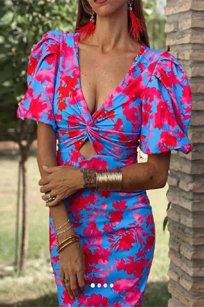 Sophia – Vestido Midi Floral con Manga Globo y Nudo Central
