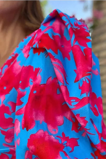 Sophia – Vestido Midi Floral con Manga Globo y Nudo Central