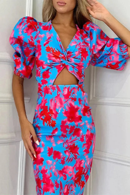 Sophia – Vestido Midi Floral con Manga Globo y Nudo Central