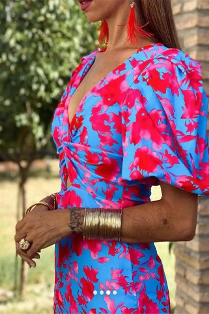 Sophia – Vestido Midi Floral con Manga Globo y Nudo Central