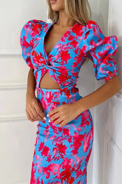 Sophia – Vestido Midi Floral con Manga Globo y Nudo Central